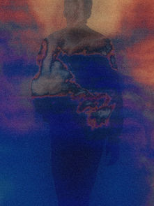 Silhouette of a person amidst swirling orange and blue abstract patterns, creating a mysterious and ethereal atmosphere.
