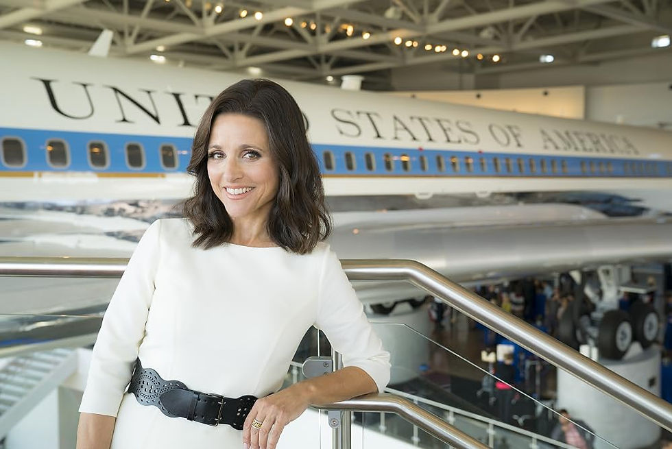 A woman poses in front of Air Force 1.