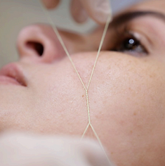 Epilação facial com linha