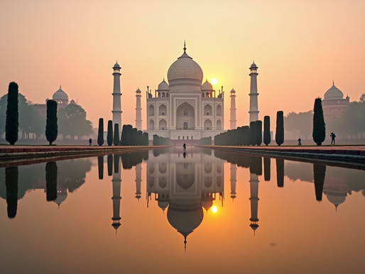 The Taj Mahal reflecting in the water at sunrise