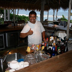 A man behind a bar on Nikoi Island