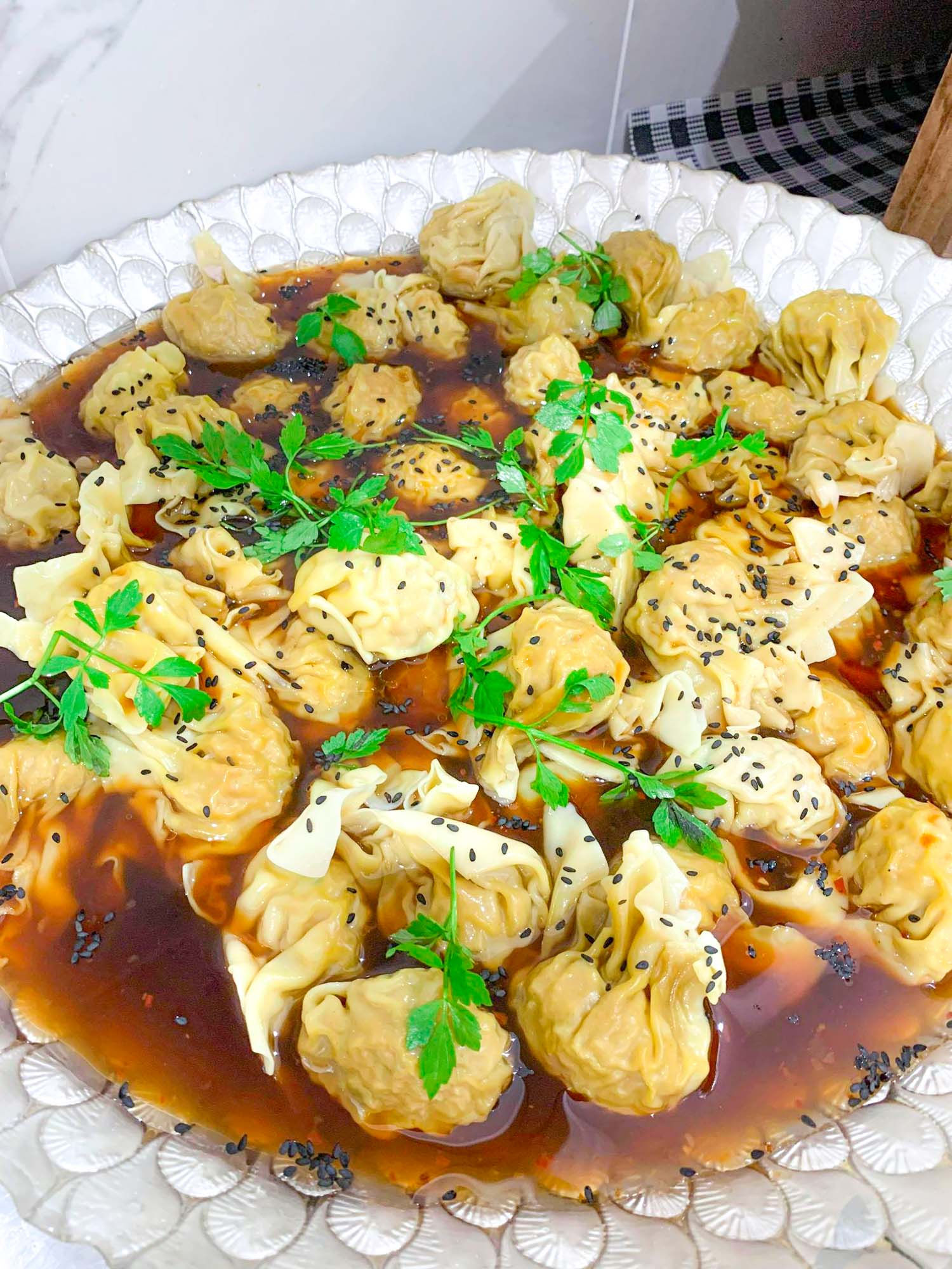 Steamed Dumpling with signature sauce (10 cups )