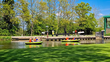 River Nene Cottages canoeists by lock
