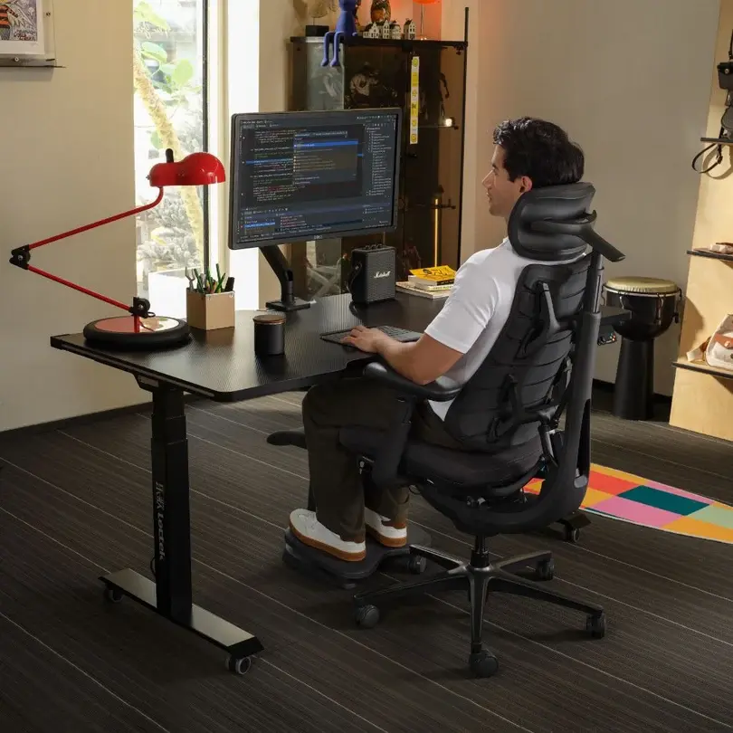 Ergonomic office chair at a modern workstation.