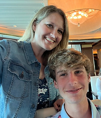My son and I in the main dining hall on Royal Caribbean Independence of the Seas.