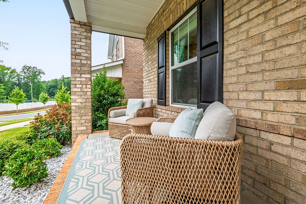 Tastefully Decorated Exterior Sitting Area in Rental Homes Porch.jpg