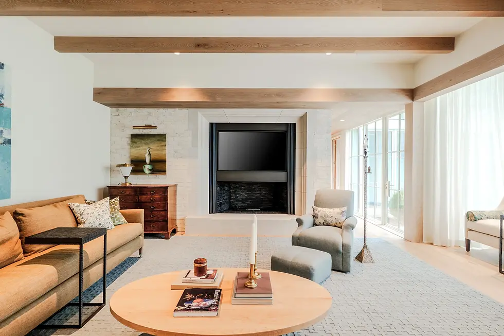 Luxury Living Room with Cozy Seating area and Stone Fireplace Surround.webp