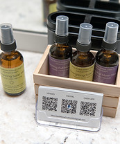 detail-amenity-toiletry-set-qr-code-amber-bottles.jpg