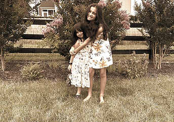 two sisters hugging