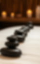Hot stones placed on a massage table_edited.jpg