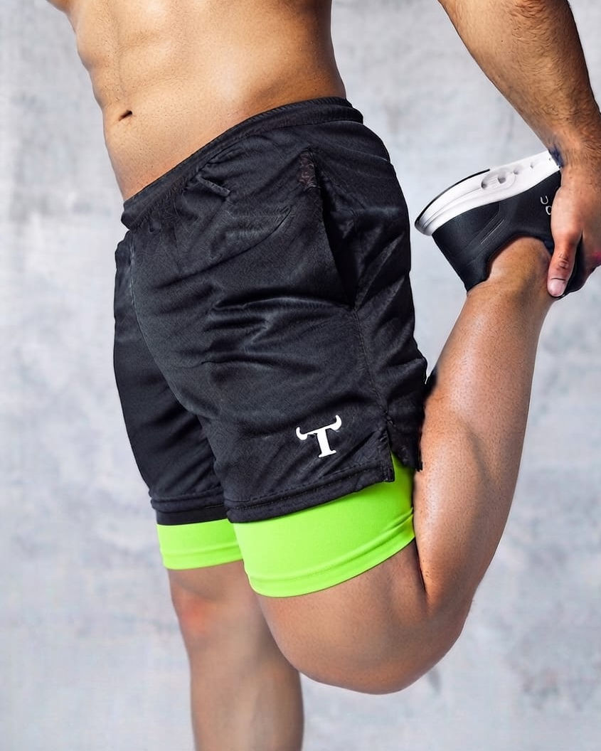 Short con calza hombre verde fluo