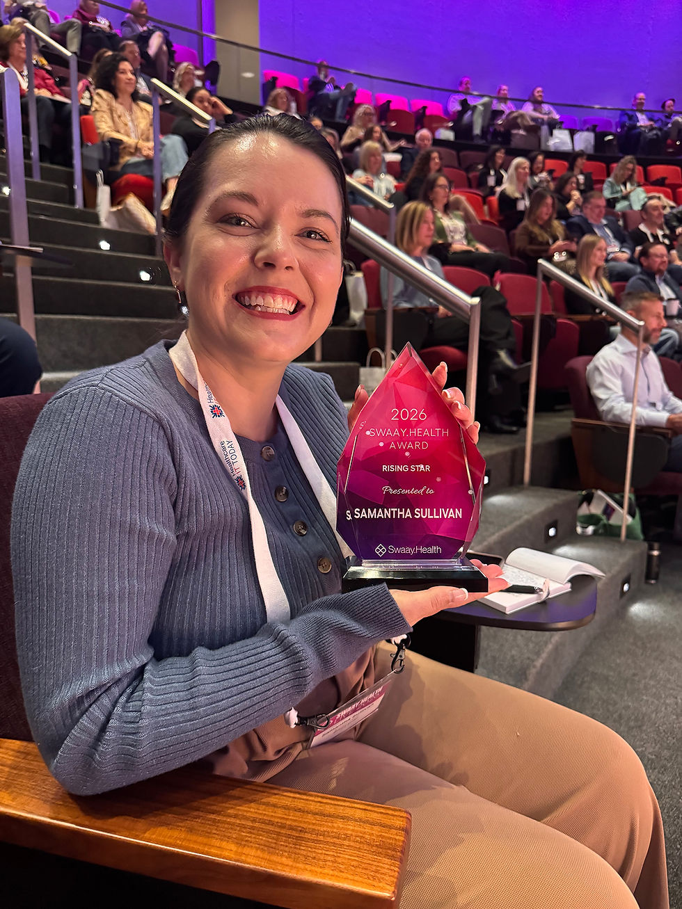 A smiling Samantha Sullivan holds a 2026 Rising Star Award at the 2026 Swaay.Health conference.