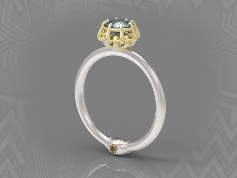 A stone set designer engagement ring in
white and yellow gold with sapphires.