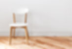 White chair in an empty room