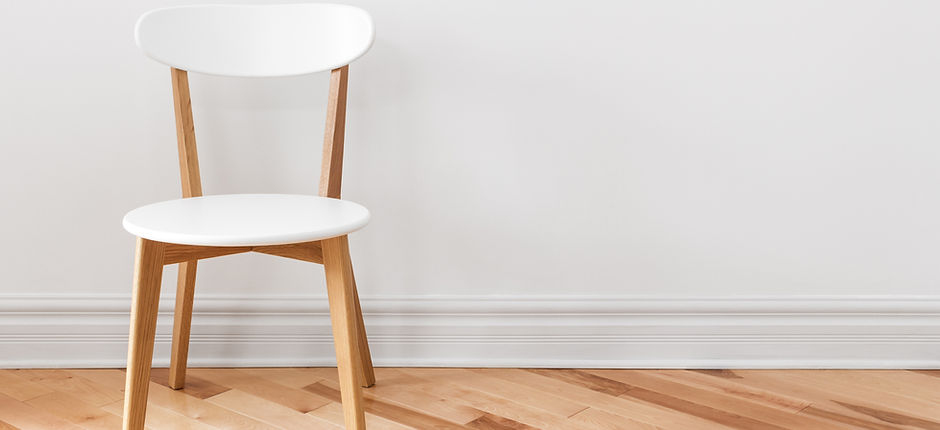 White chair in an empty room