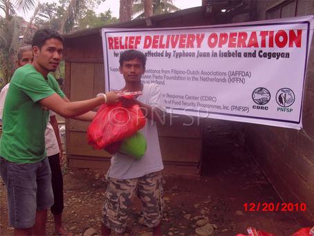 Distributing Relief Packs in Isabela
