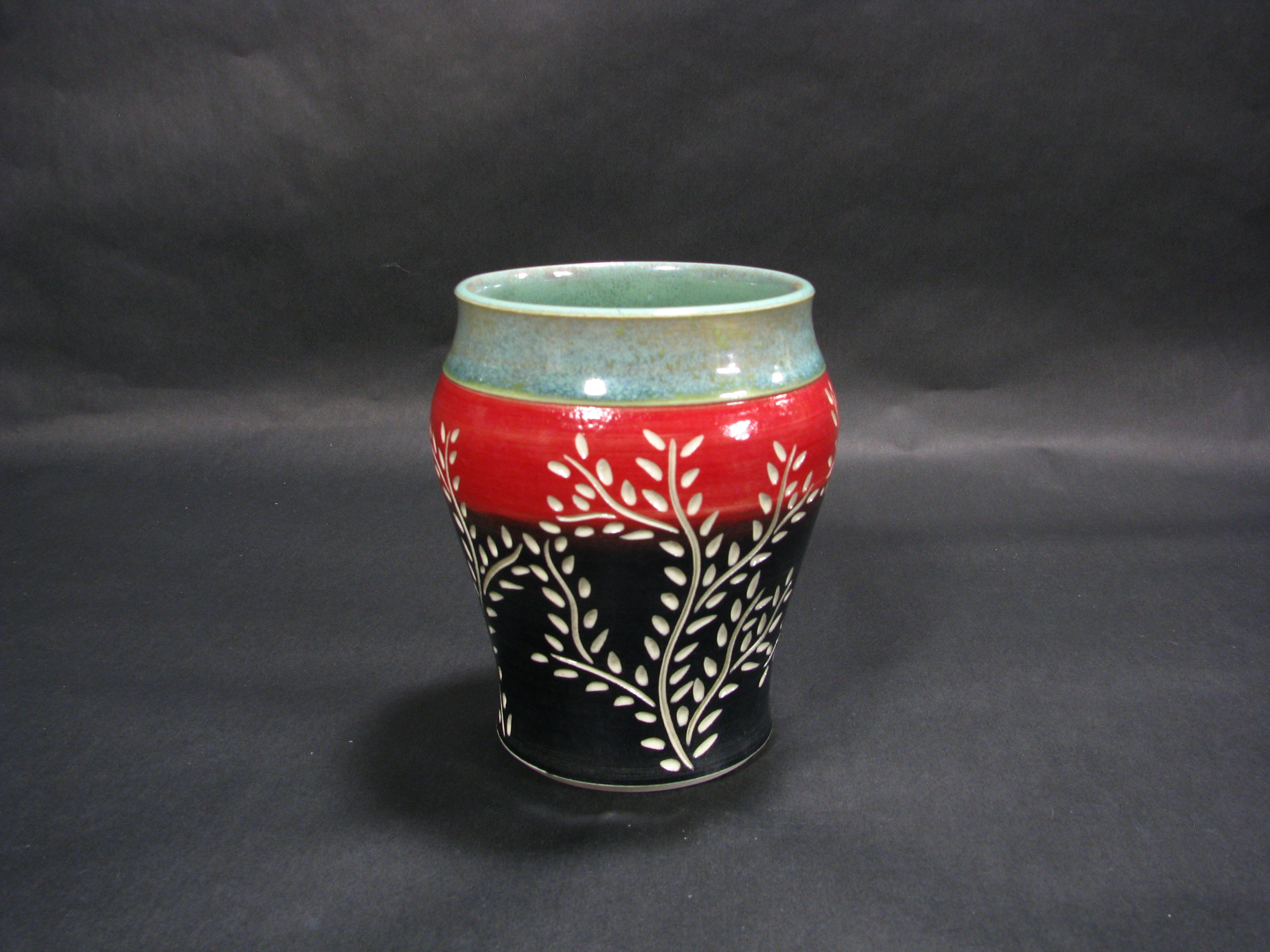 Small Red, Black, and Teal Vase