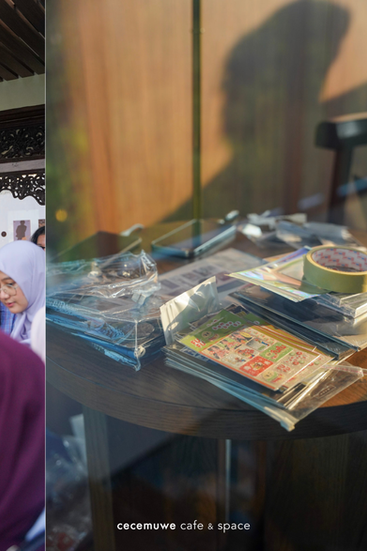 Event merchandise and activity materials prepared for a community gathering at Cecemuwe Café & Space, a private event venue in South Jakarta.