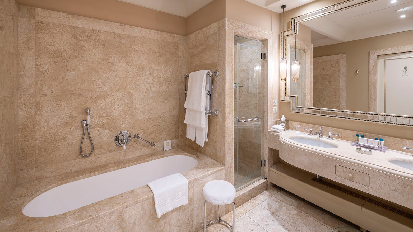 VENICE SUITE
A vision of timeless elegance, the Venice Suite is decorated with classic furnishings and luxurious textiles, including plush platinum carpeting and silk wallcoverings. The peaceful setting is enhanced by captivating views of the palace’s idyllic gardens and historic courtyard.
With its spacious layout and welcoming foyer, the suite is particularly popular with families.
Designed with your comfort and convenience in mind, it features a separate entrance area and living room, along with a walk-in closet to help you settle in during your stay. An extra bed is also available upon request to ensure a comfortable stay for an additional guest.
Sofa bed is available in the room to ensure a comfortable stay for an additional guest.
85SQM / 914SQF Garden or Courtyard View