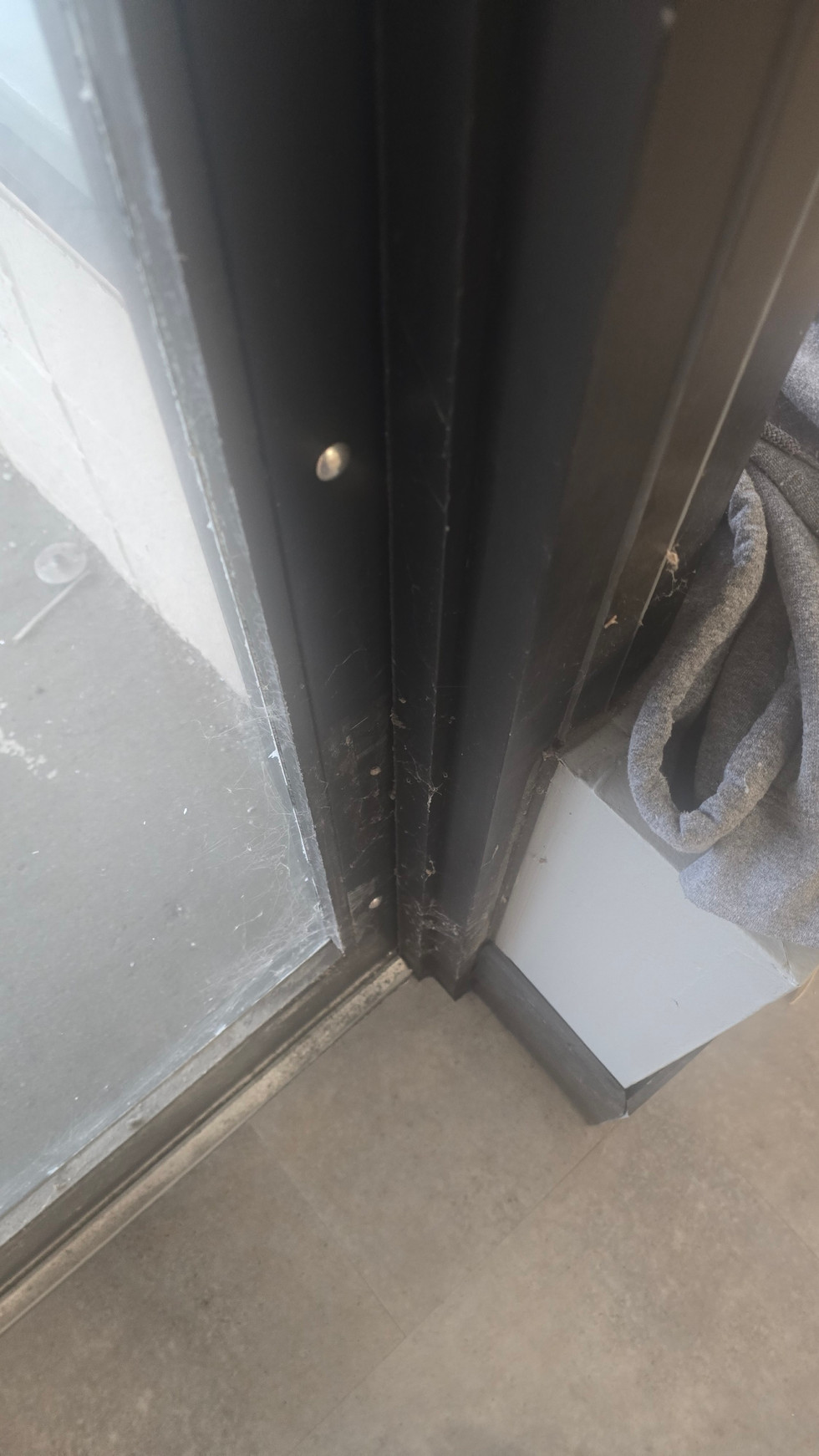 Window tracks commonly trap dust and debris during construction.