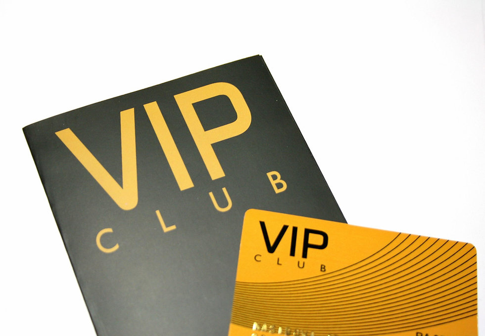 Two credit sized cards with the words VIP wrote on them
