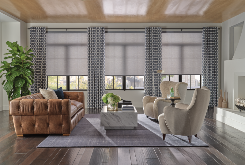 Grey roller shades in living room in Penctiton
