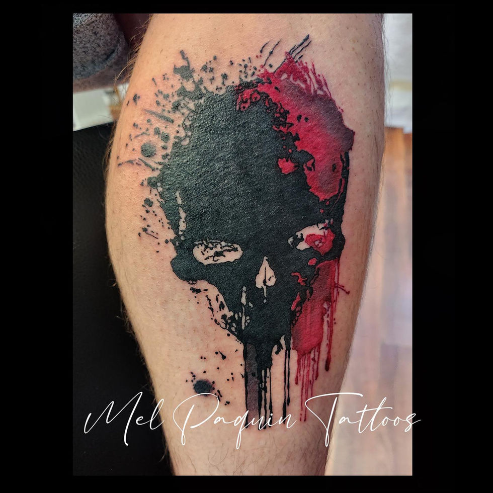 Black and red trash polka skull tattoo on the leg, Gatineau tattoo