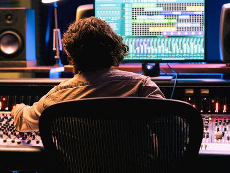 Online Mixing and Mastering Services: What to Look For Before You Send Your Tracks -  an engineer in his studio