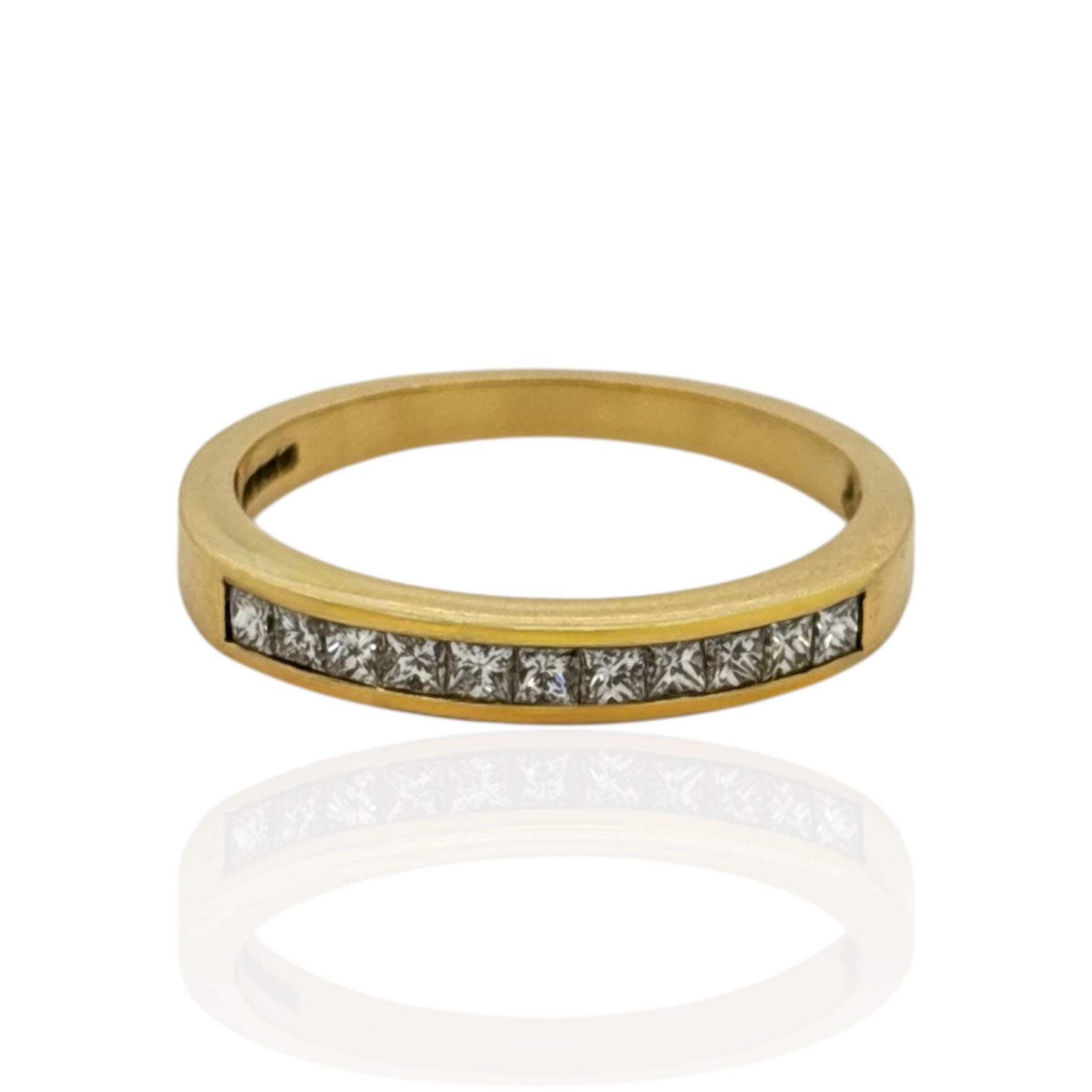 PRINCESS CUT DIAMOND HALF ETERNITY RING