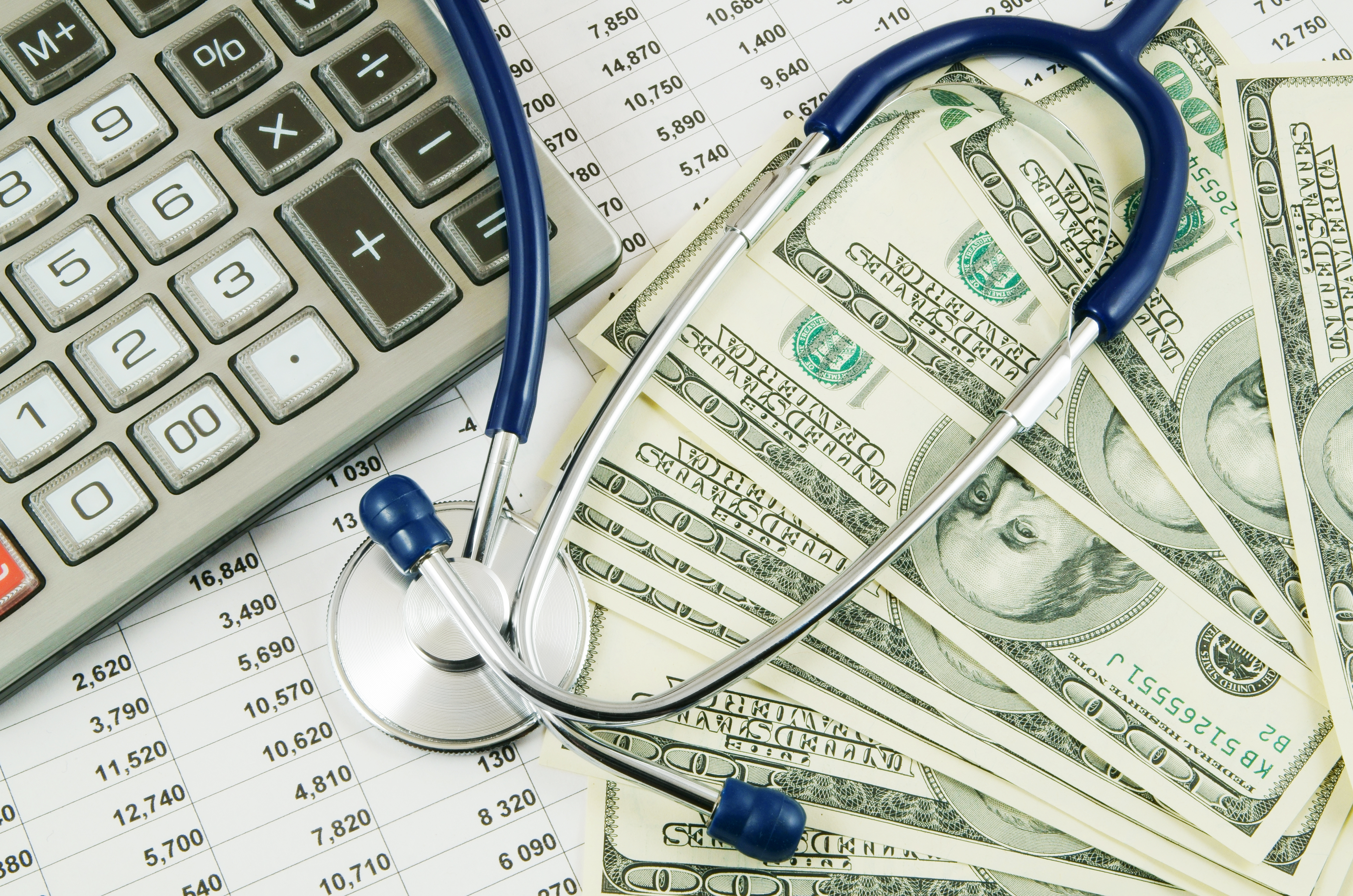 Cost of health care concept, stethoscope and calculator on documents.jpg