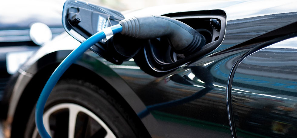 Black Electric Vehicle being charged