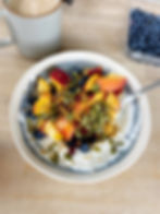 high protein yogurt bowl with fruit and coffee