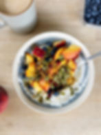 high protein yogurt bowl with fruit, nuts and bee pollen