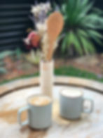 brewed purity coffee sitting on a wooden table