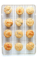 Blueberry cottage cheese muffins on a cooling rack