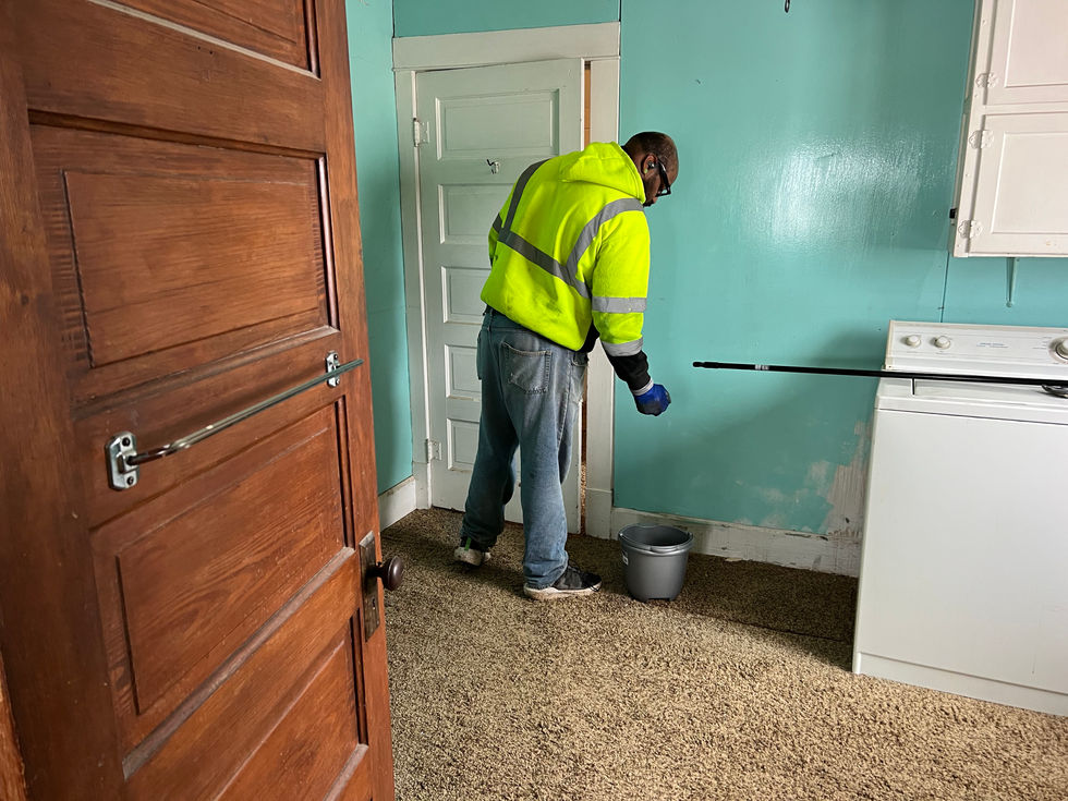 Interior reset work in progress, preparing walls and space after debris removal.