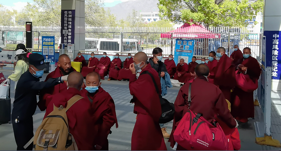 monks, robes, red, Tibet, Lhasa, train station, red robes, travellers,