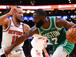 Brown attempts to score on Tatum
