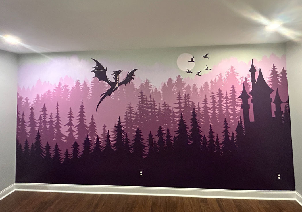 Fantasy-inspired wall mural of a dragon, florals, and a woman rising from stacked books painted above a bookshelf