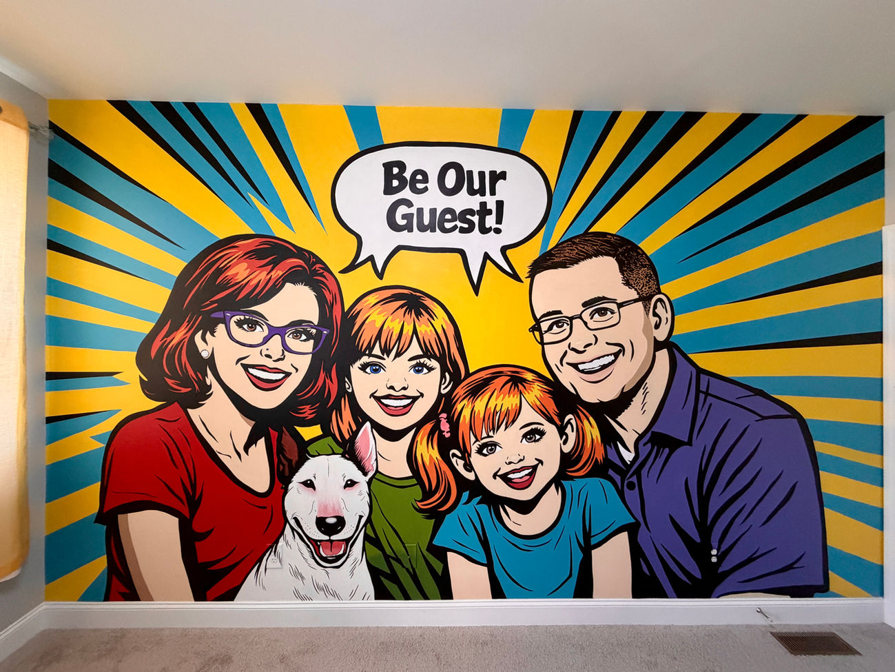 Custom pop art family mural with bright colors, comic style illustration, and speech bubble painted on a large wall