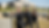 Eye-level view of a law enforcement officer practicing tactical maneuvers on a training ground