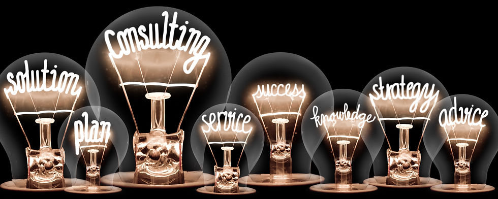 Photo of light bulbs with shining fibers in a shape of CONSULTING concept related words is