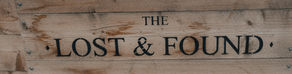 A sign reading "The Lost and Found"