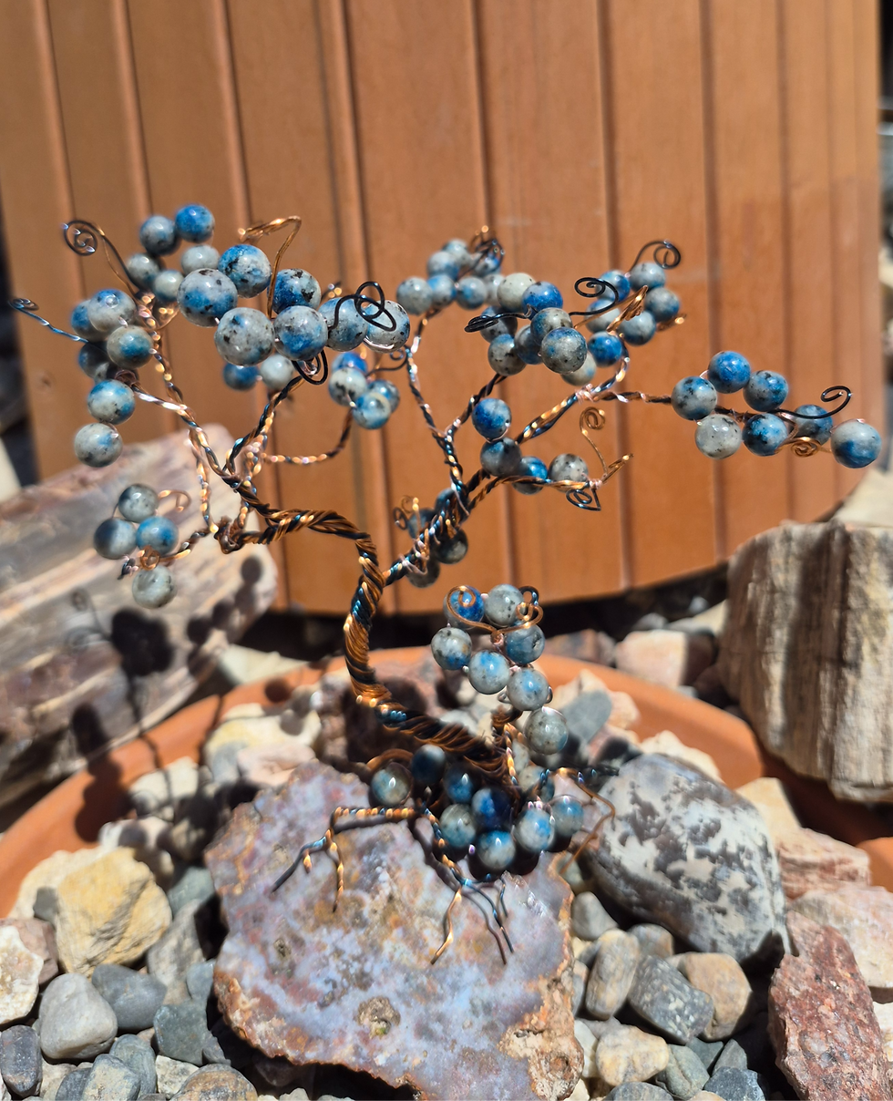 Thumbnail: K2 stone wire tree with Third Eye Chakra frequencies on a chalcedony agate base rock