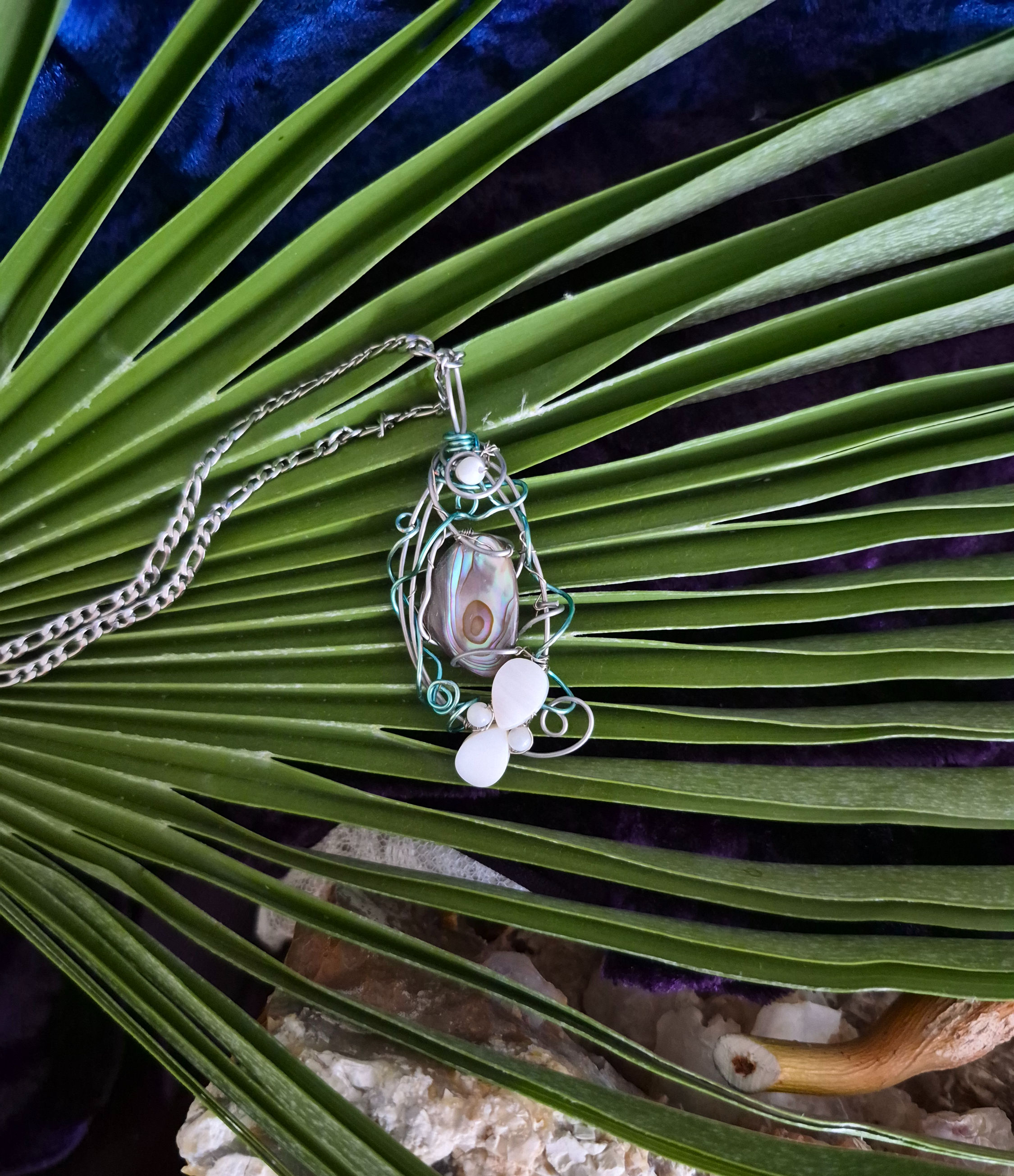 Abalone Shell with Mother of pearl on stainless-steel wire, blue accent wire
