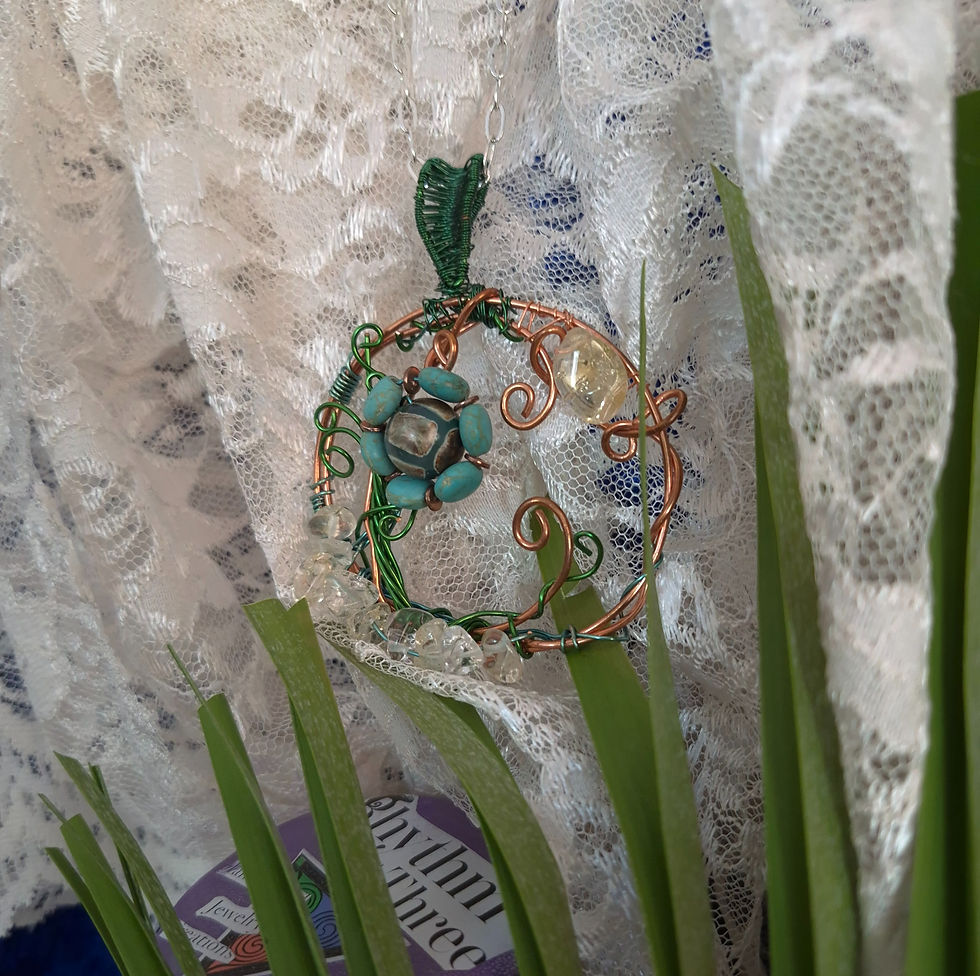 Thumbnail: Dragon Vein Jasper central to 5 blue howelite beads creating a daisy flower, green wire stem, citrine stone sun, Quartz base