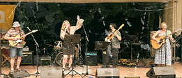 Woman and band singing