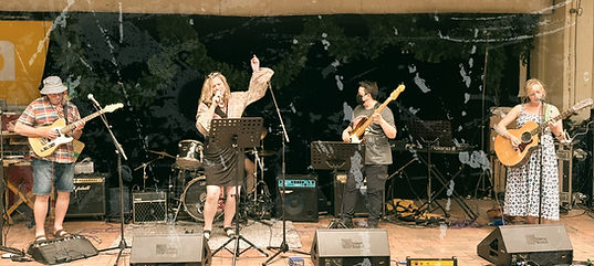 Woman and band singing