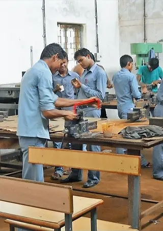 Students Repairing machines