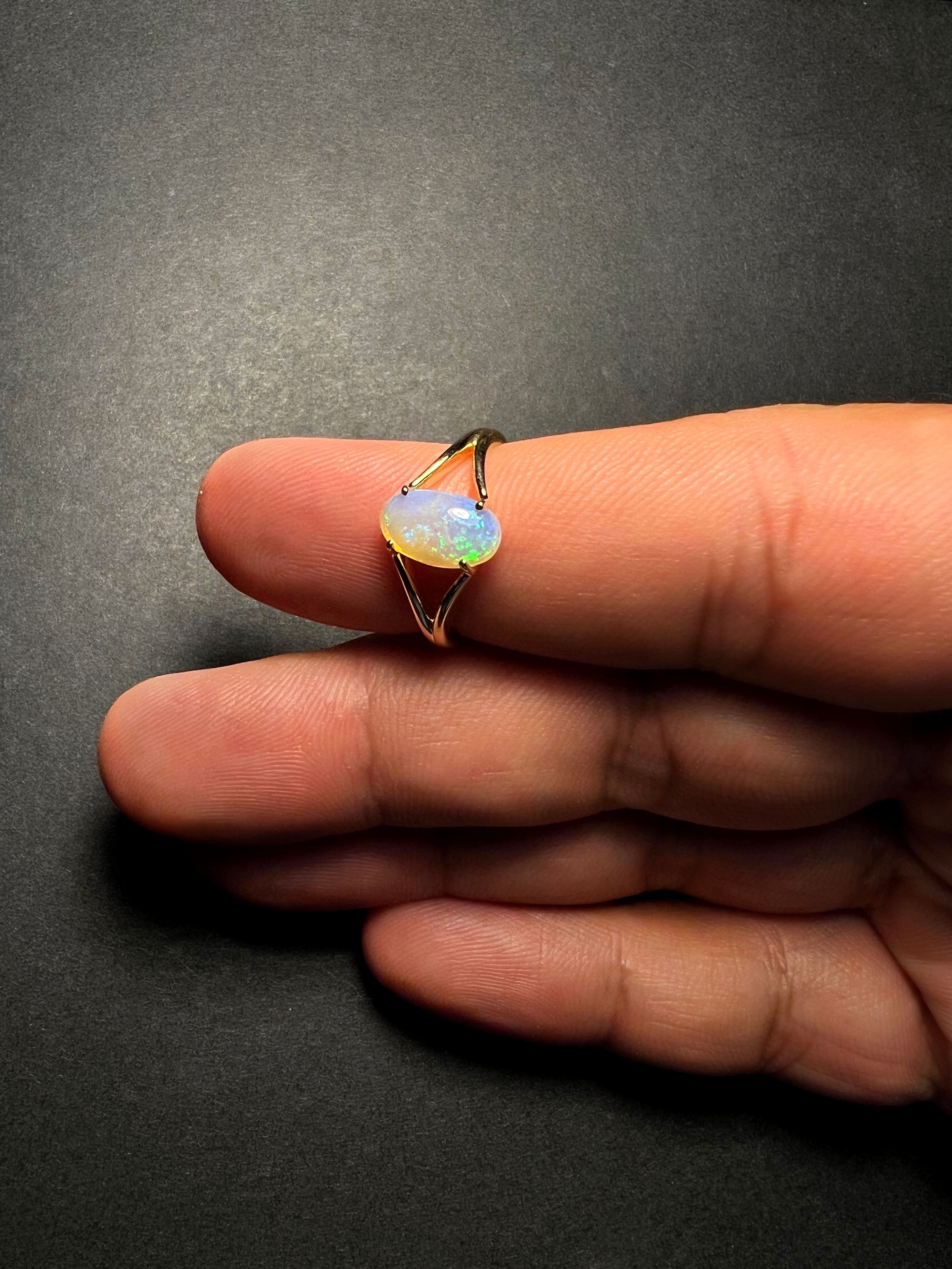 Solid gold & crystal opal ring - size: 8